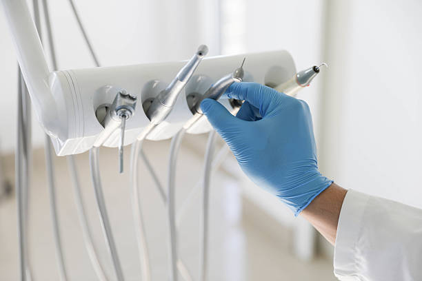Professional Tooth Extraction technician working in Southlake, TX